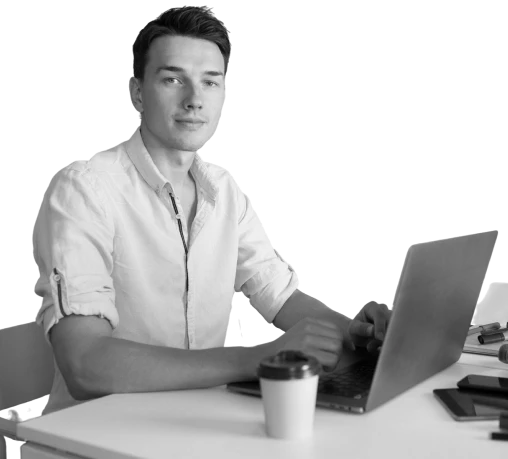 handsome-young-man-working-laptop-typing-freelance-job-online-1.webp